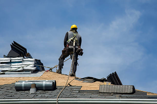 Professional Roof Replacement technician working in Powers, OR